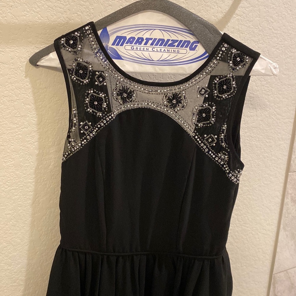 Black dress with pretty black and fun beading detail.